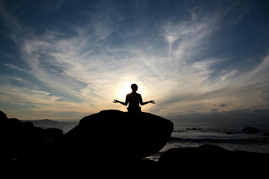 A Man Does A Yoga Pose On A Large Rock Photograph by R&d Foto - Fine ...