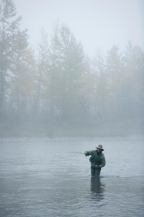 40's Photograph - A Man Fly-fishing On Elk River, Bc by Henry Georgi 40's Photograph - A Man Fly-fishing On Elk River, Bc by Henry Georgi