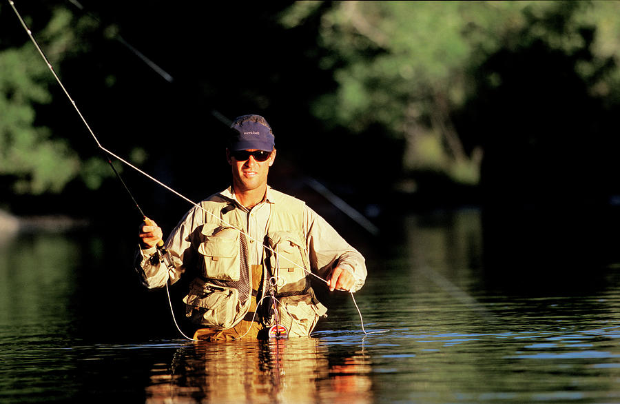 A Man Fly Fishing On Silver Creek by Corey Rich