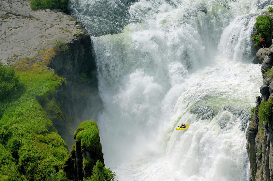 Waterfall Photograph - A Man Kayaks Down Lower Mesa Falls by Lucas Gilman