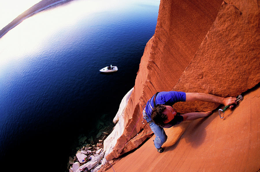 Boat Photograph - A Man Rock Climbing by Corey Rich