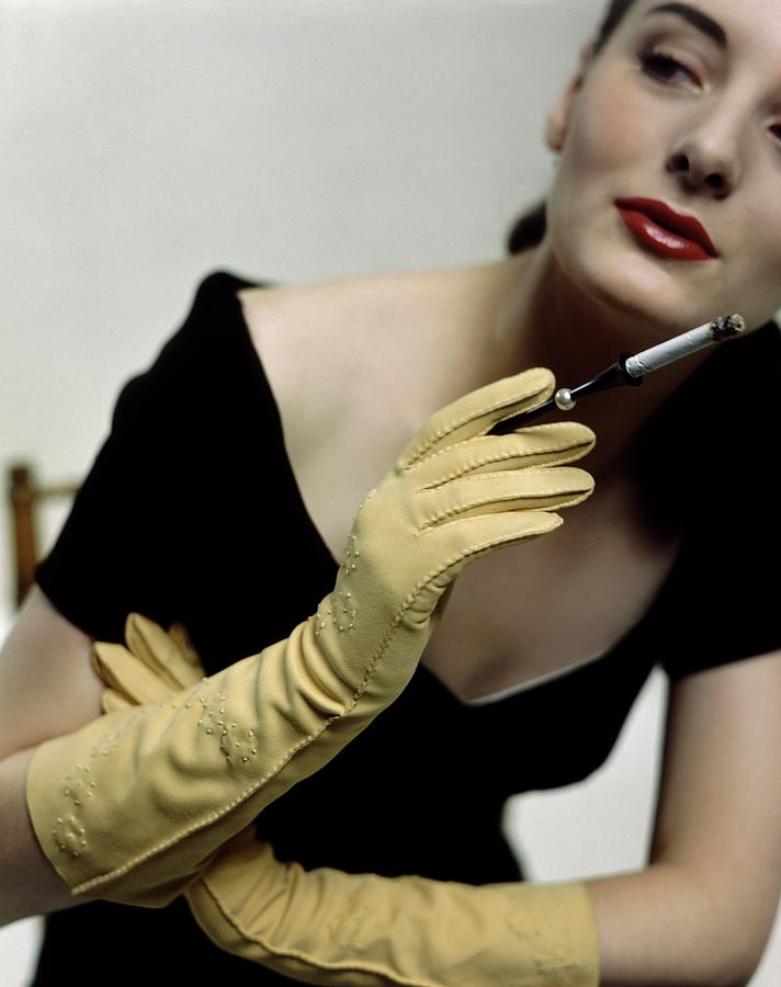 A Model Holding A Alfred Orlik Cigarette Holder Photograph by Serge Balkin