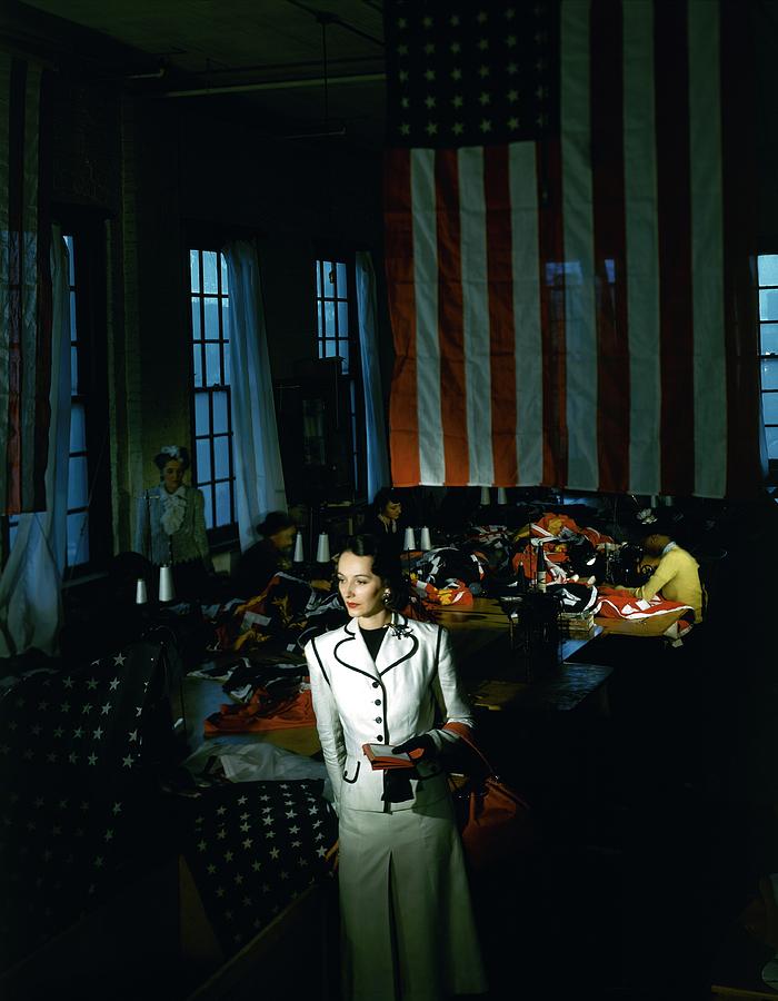 A Model In Front Of An American Flag Photograph by Horst P. Horst