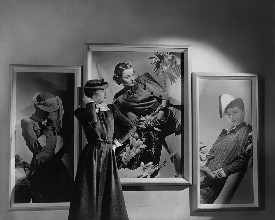 A Model In Front Of Photographs Photograph by Horst P. Horst