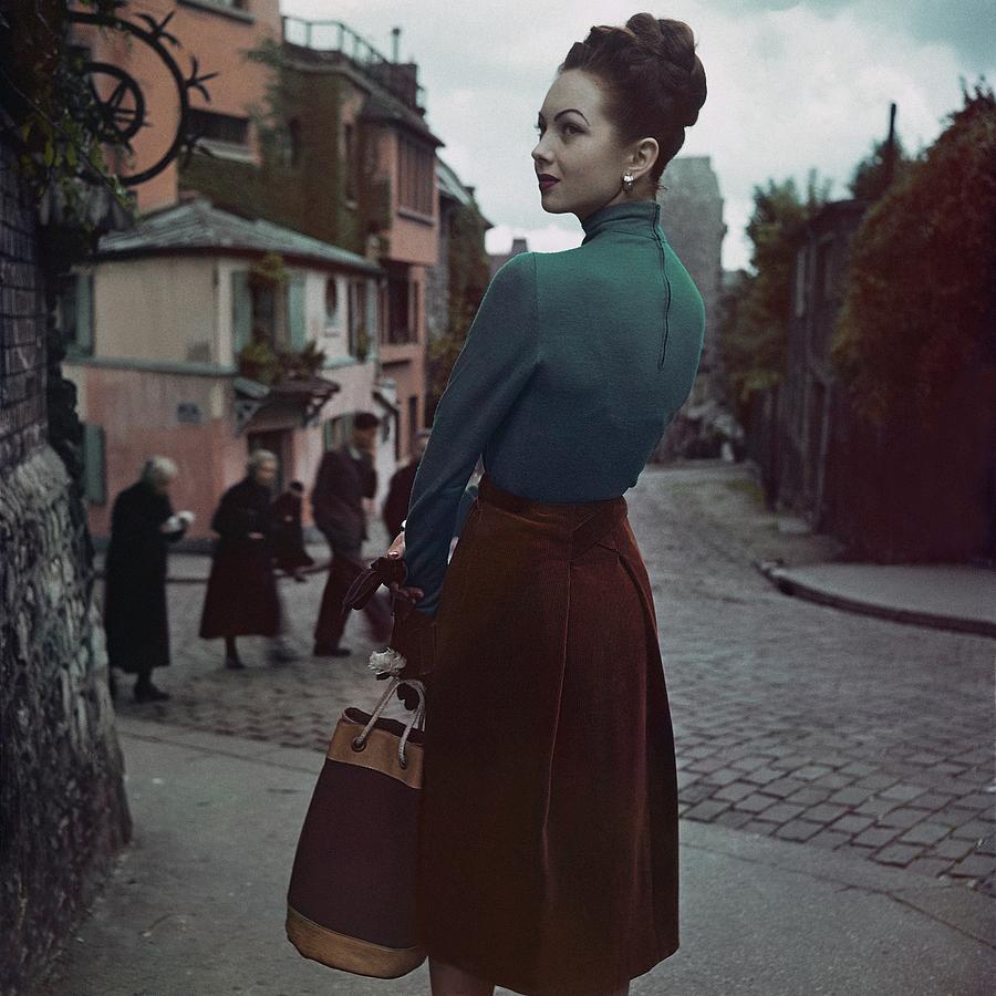 A Model In Paris Photograph by John Rawlings