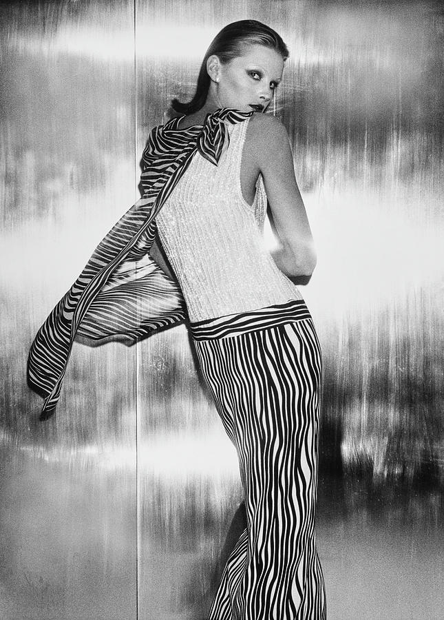 A Model Looks Over Her Shoulder In A Skirt Photograph by Chris von Wangenheim