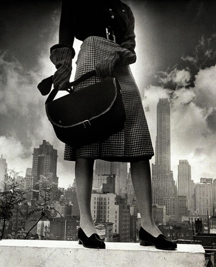 City Photograph - A Model On A Ledge by John Rawlings