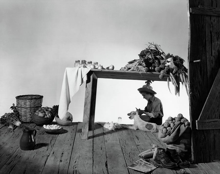 A Model Peeling Potatoes Photograph by Horst P. Horst