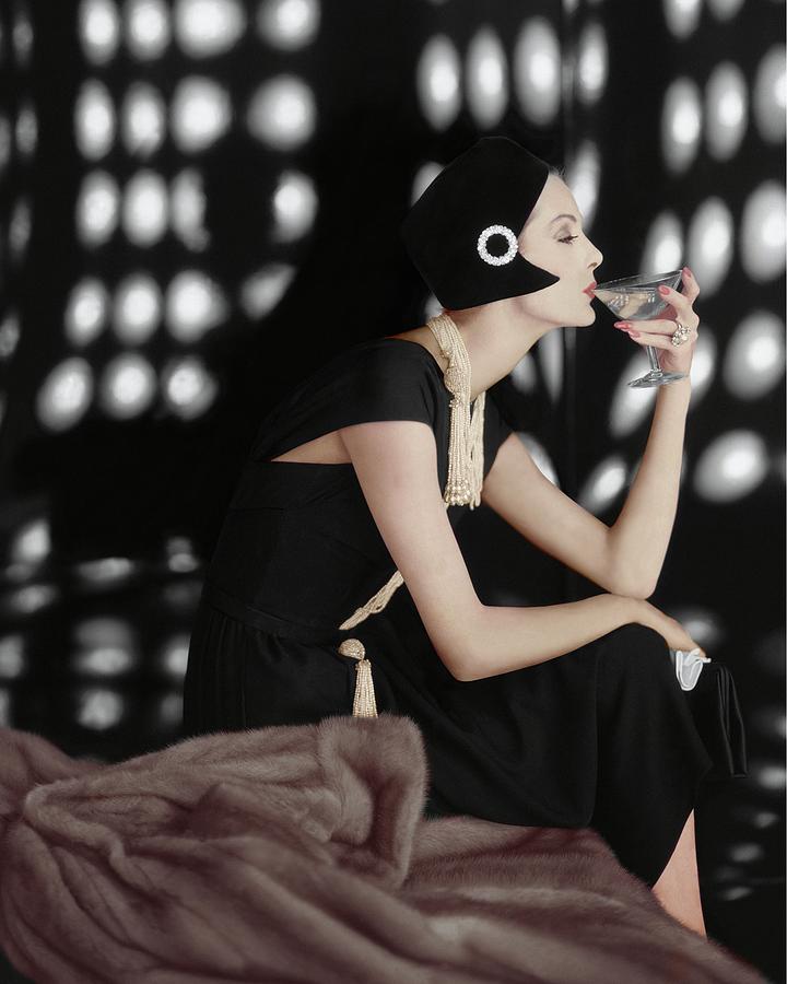 A Model Wearing A Branell Dress Photograph by Karen Radkai