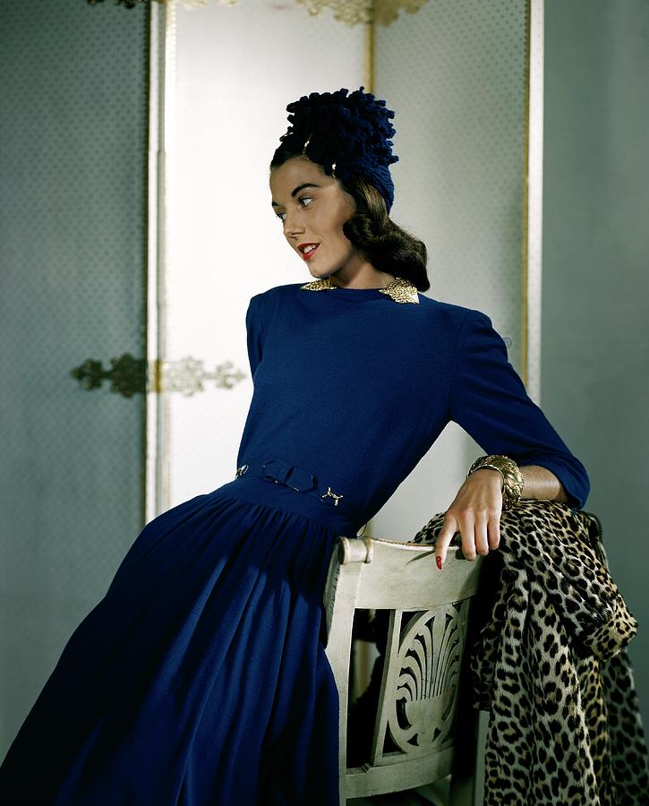 A Model Wearing A Cap And Dress Photograph by Horst P. Horst