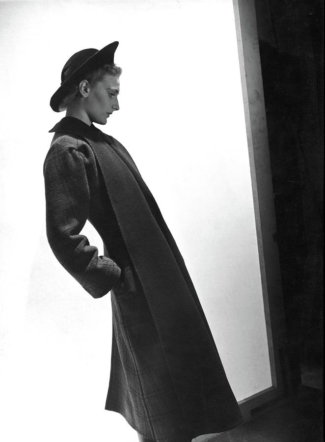 A Model Wearing A Coat And Dress By Alix Photograph by Horst P. Horst