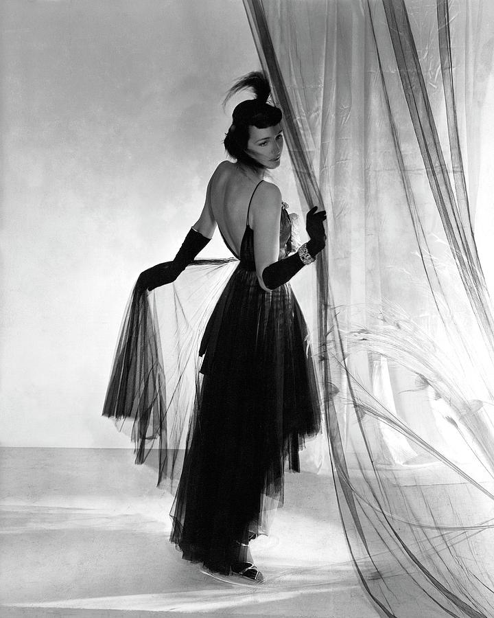 A Model Wearing A Dress And Gloves Photograph by Horst P. Horst