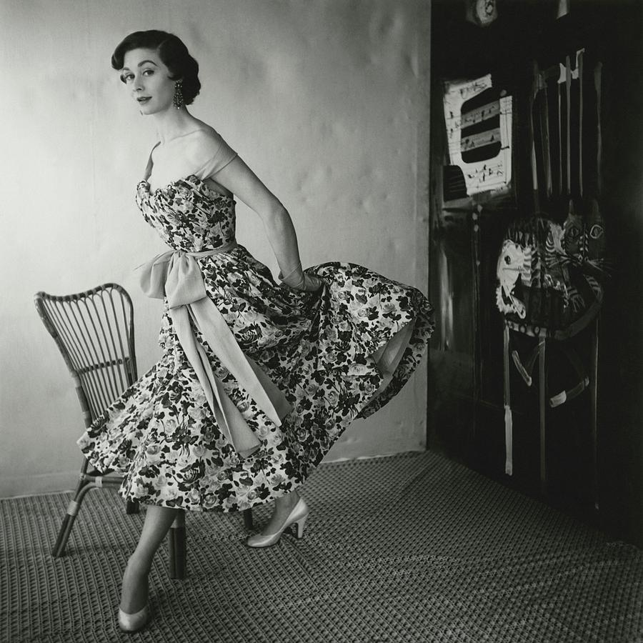 A Model Wearing A Floral Dress Photograph by Henry Clarke