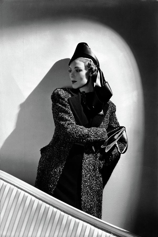 A Model Wearing A Hat And Coat Photograph by Horst P. Horst