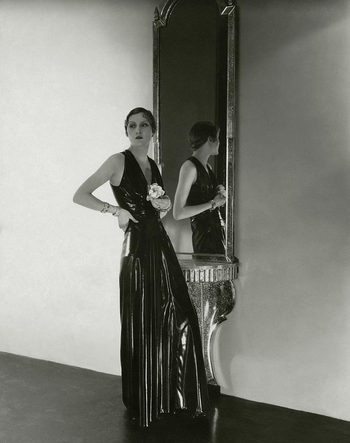 A Model Wearing A Lezard Noir Dress Photograph by George Hoyningen-Huene A Model Wearing A Lezard Noir Dress Photograph by George Hoyningen-Huene