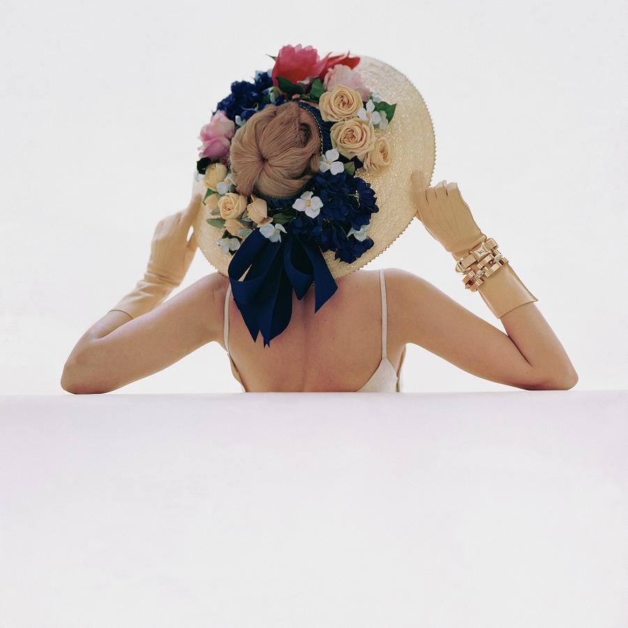 A Model Wearing A Lilly Dache Hat Photograph by John Rawlings