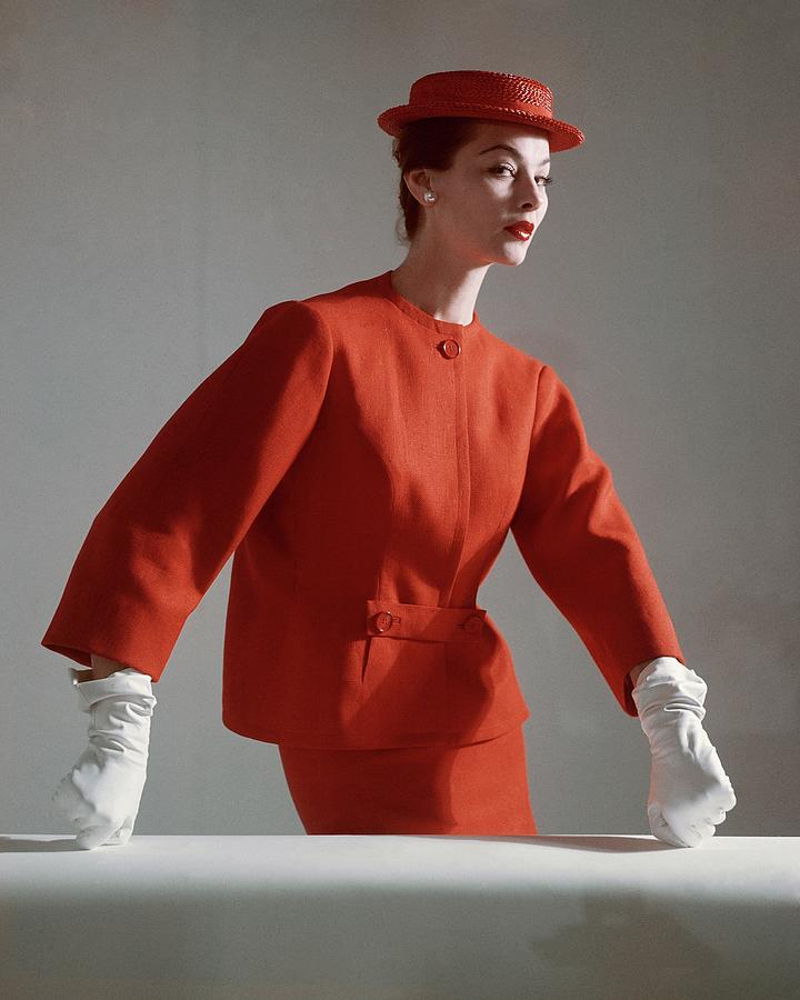A Model Wearing A Red Suit With Matching Hat Photograph by Horst P. Horst