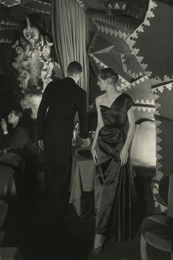 A Model Wearing A Schiaparelli Dress Photograph by Donald Honeyman