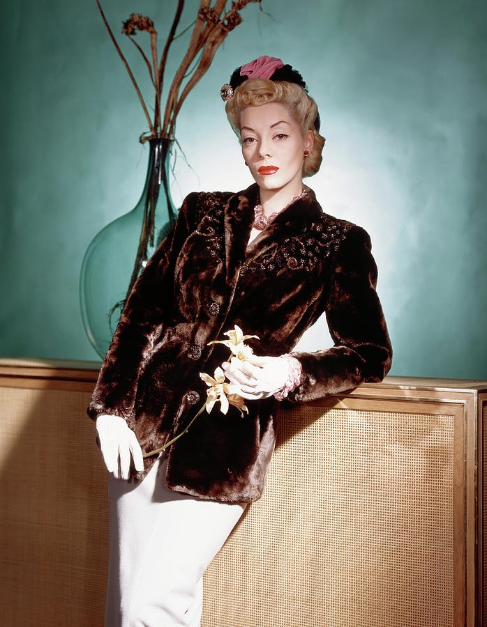 A Model Wearing A Sealskin Jacket Photograph by Horst P. Horst