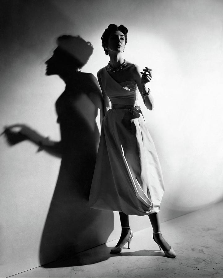 A Model Wearing A Silk Dress Photograph by Cecil Beaton