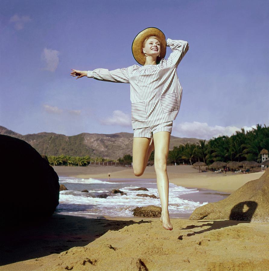 A Model Wearing A Smock Top And Matching Shorts Photograph by Sante Forlano