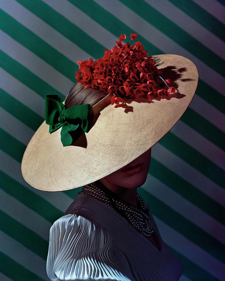A Model Wearing A Straw Hat Photograph by Andre Durst