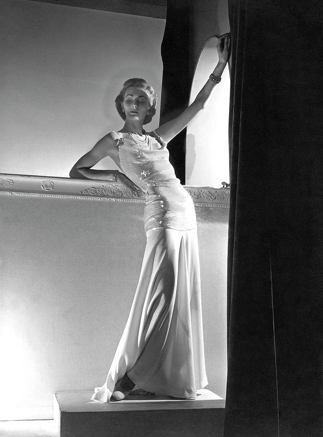 A Model Wearing A Sweater And Skirt Photograph by Horst P. Horst