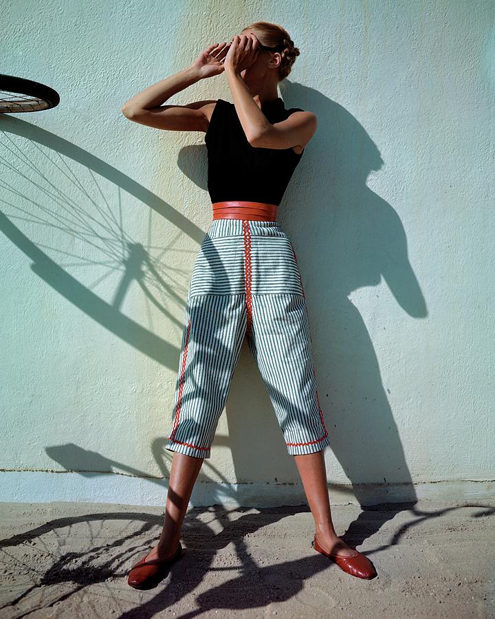A Model Wearing A Turtleneck And Capri Pants Photograph by Serge Balkin