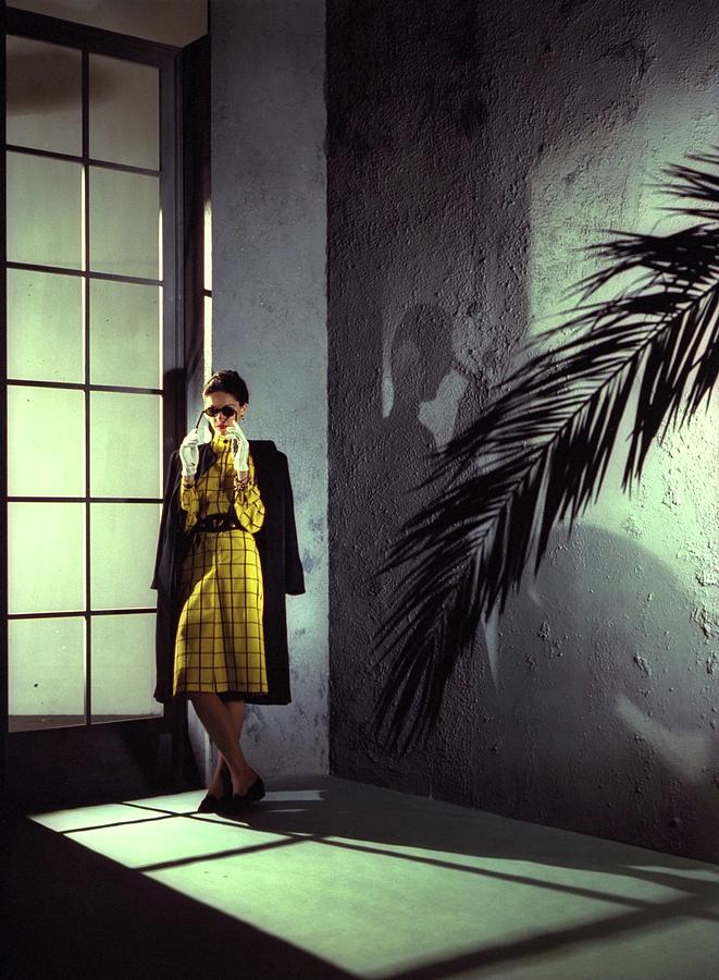 A Model Wearing A Yellow Dress Photograph by Serge Balkin