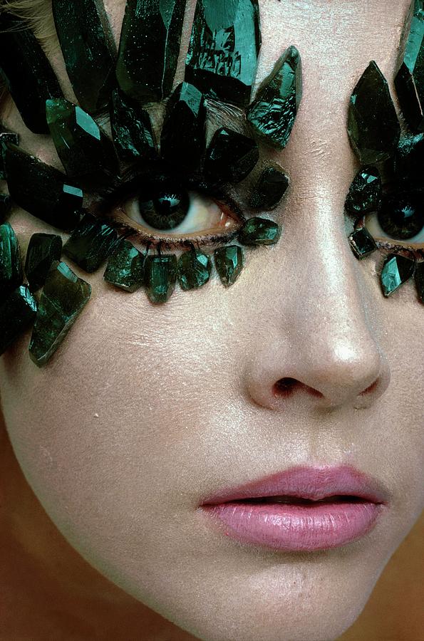A Model Wearing Eye Ornaments Photograph by Gianni Penati