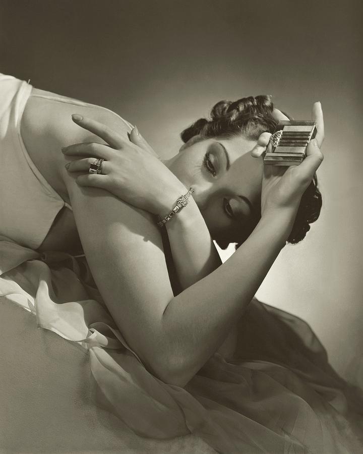 A Model Wearing Tiffany And Co Jewelry Photograph by Horst P. Horst