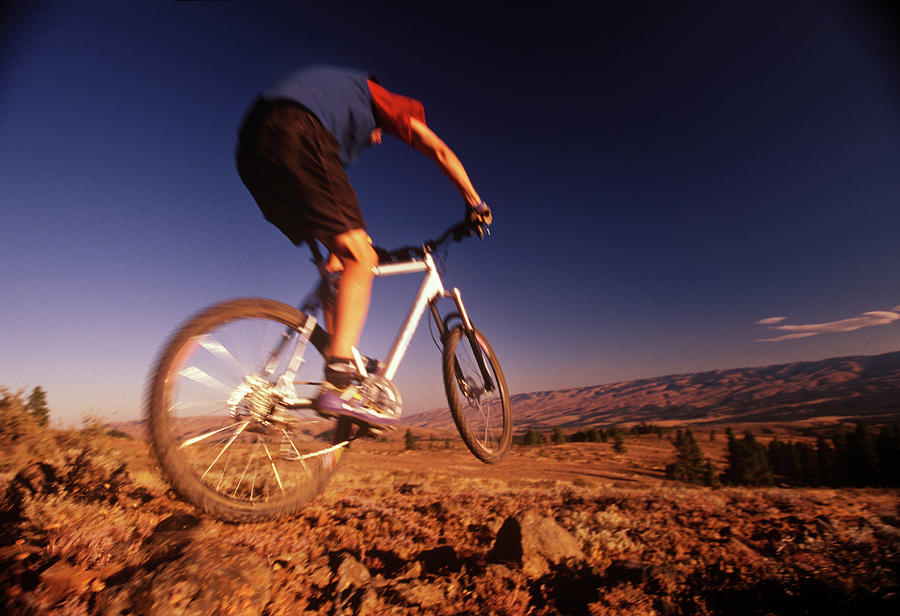 Bicycle Photograph - A Mountain Bike Rider On A Ride by Earl Harper
