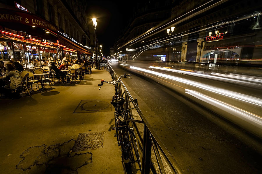 A night street scene in Paris Photograph by Sven Brogren