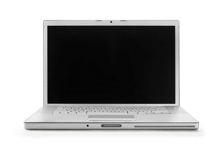 A opened laptop with a blank screen on a white background Photograph by CostinT