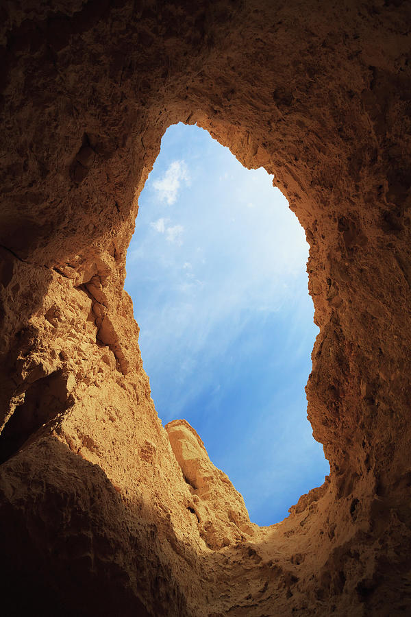 A Opening In A Cave Looking Up To The Photograph by Reynold Mainse / Design Pics