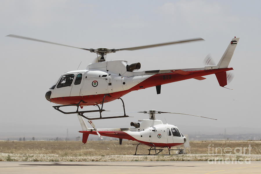 A Pair Of As350 Squirrel Helicopters Photograph by Ofer Zidon - Pixels