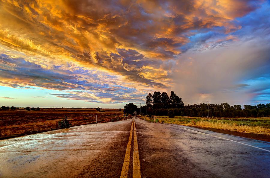Sacramento Photograph - A Passing Storm by Mike Ronnebeck
