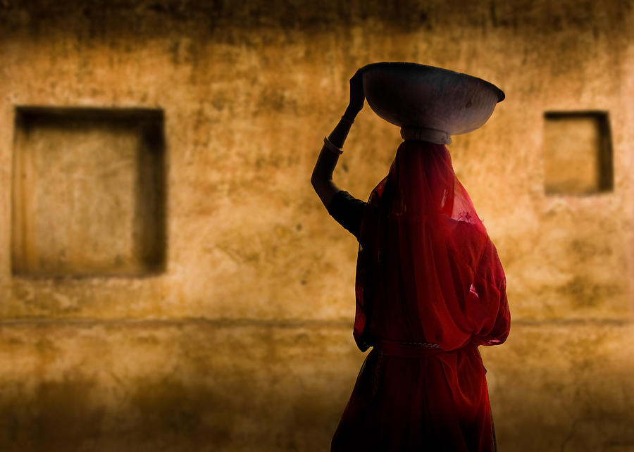 A picture of an Indian woman in a red dress Photograph by Ajiravan