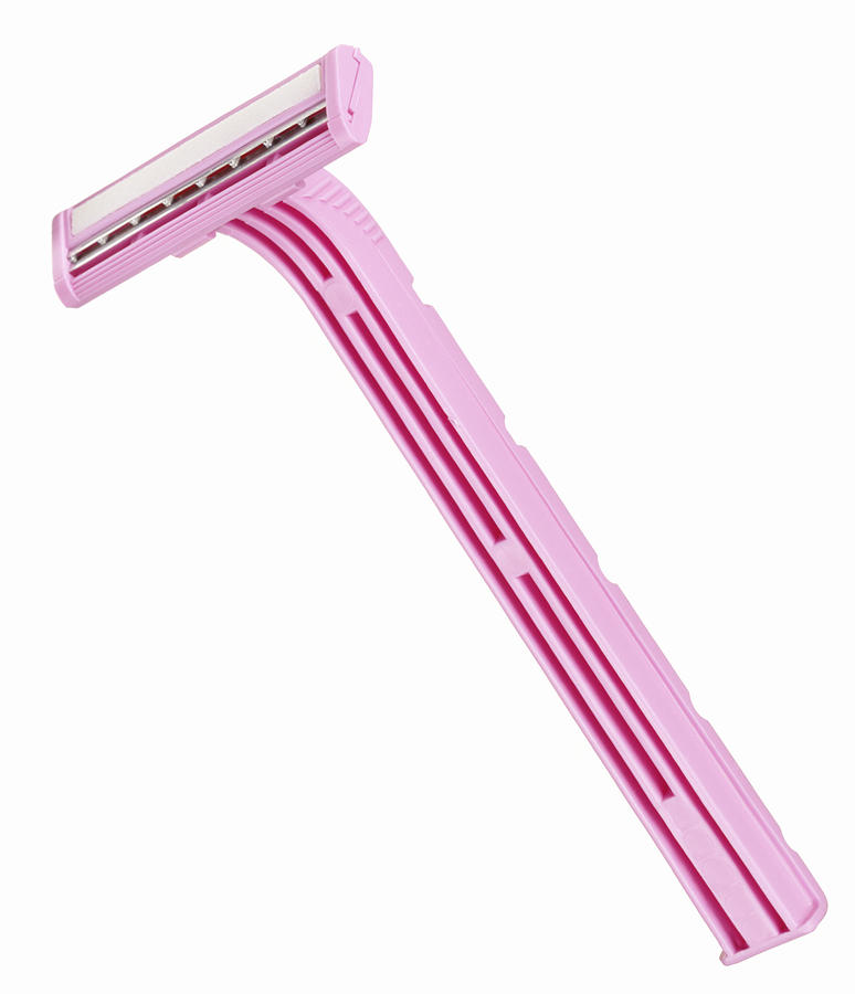 A pink ladys disposable safety razor Photograph by Steve Wisbauer