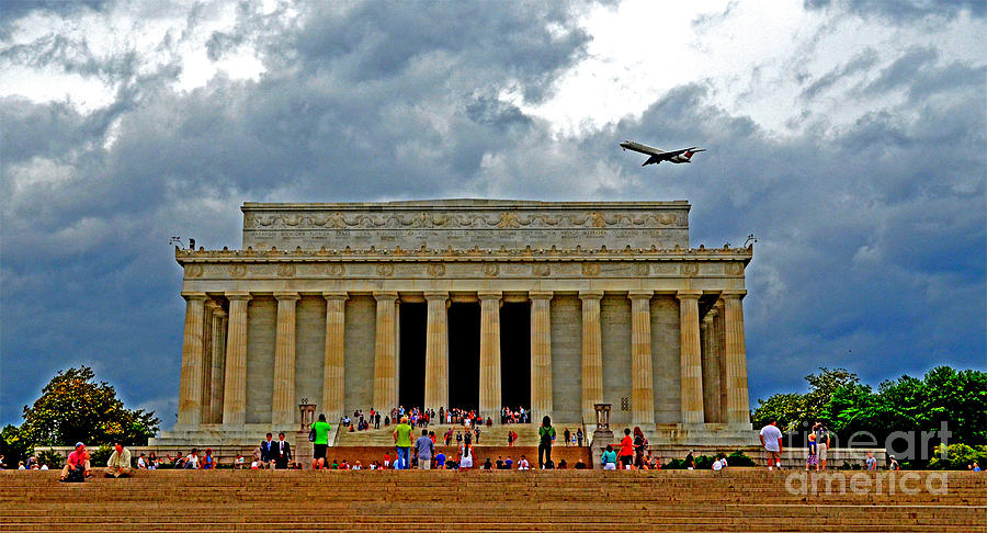 Abraham Lincoln Photograph - A Plane Flys Over the Lincoln Memorial on a Warm Rainy Day  by Jim Fitzpatrick