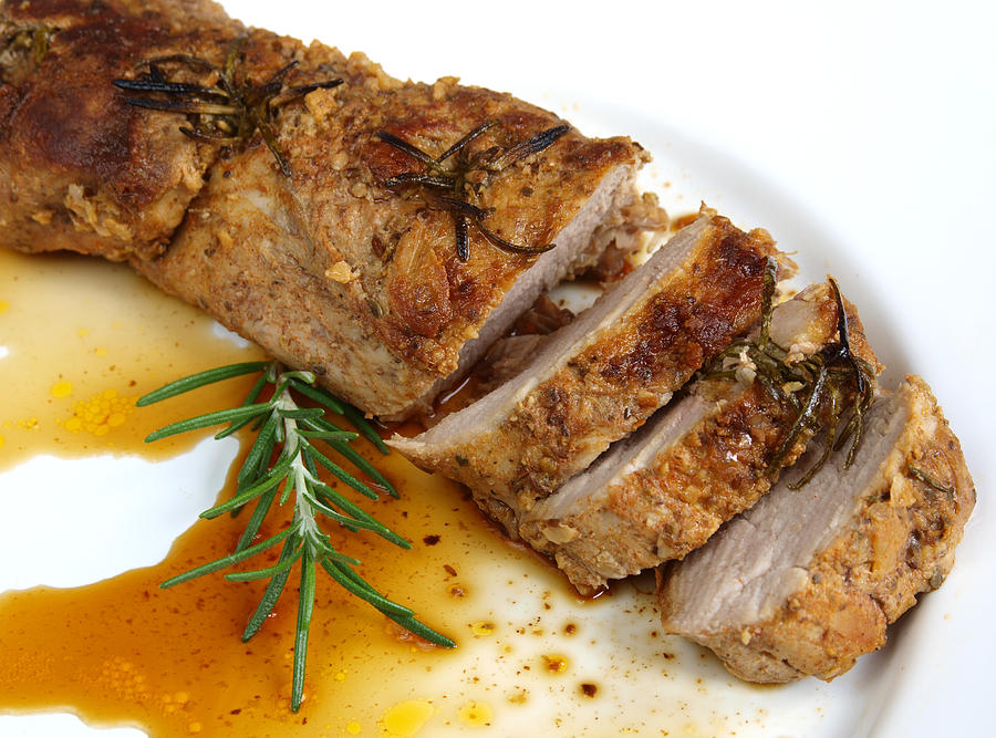 A plate of roasted pork sirloin Photograph by Libortom