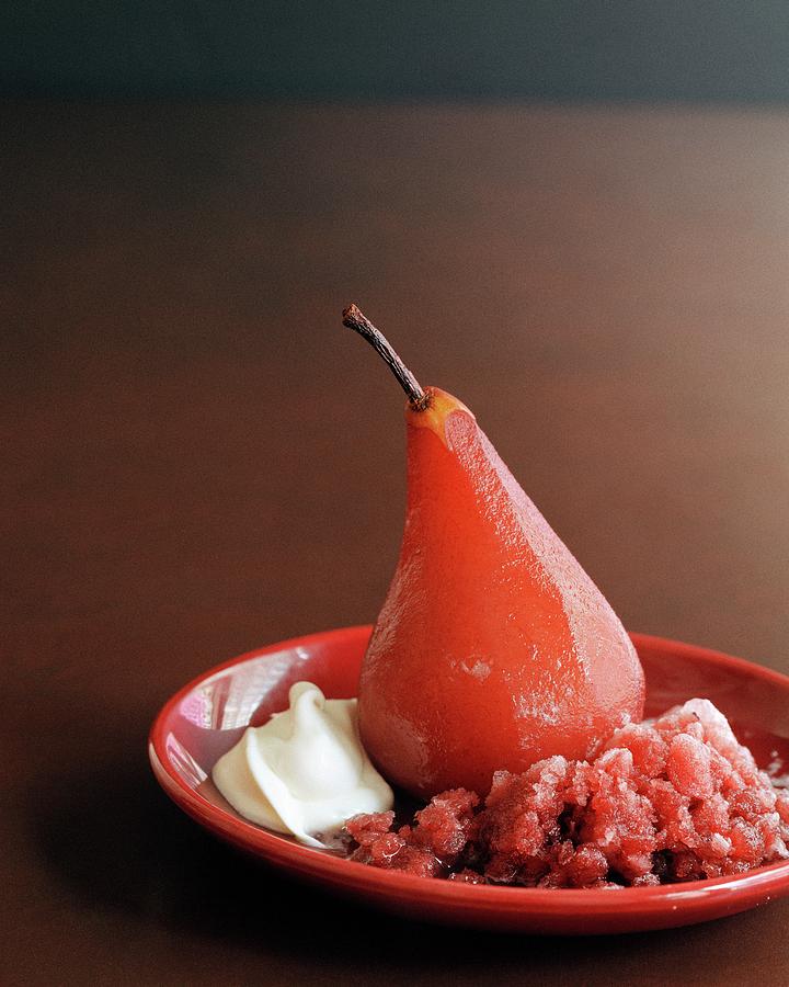 A Poached Pear Photograph by Romulo Yanes