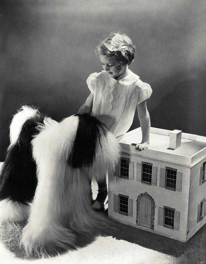 A Portrait Of A Young Girl And A Dog Photograph by Horst P. Horst