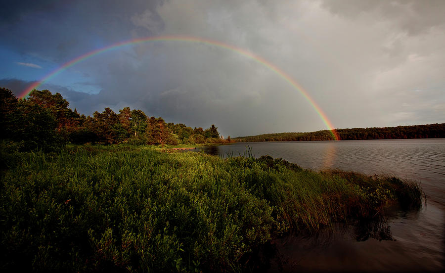 A Rainbow Forms Over A Lake Photograph by Tom Lynn - Pixels