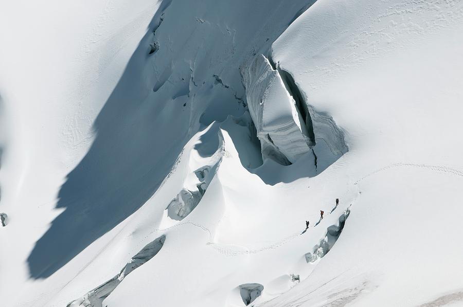 A Rope Team Travels On A Glacier Photograph by Alasdair Turner - Fine ...