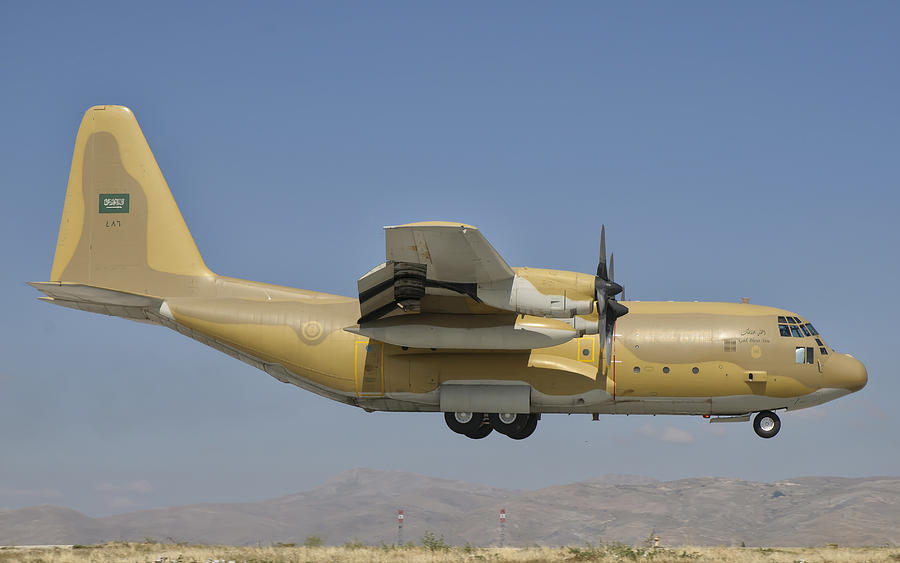 A Royal Saudi Air Force C-130 Prepares Photograph by Giovanni Colla