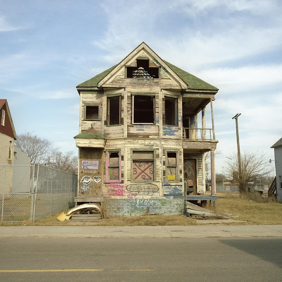 A run-down, abandoned house with graffiti on it, Detroit, Michigan, USA Photograph by Peter Baker
