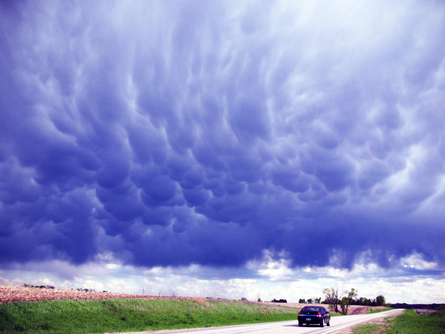 Nebraska Photograph - A rural Nebraska Highway and magnificent sky by Tyler Robbins