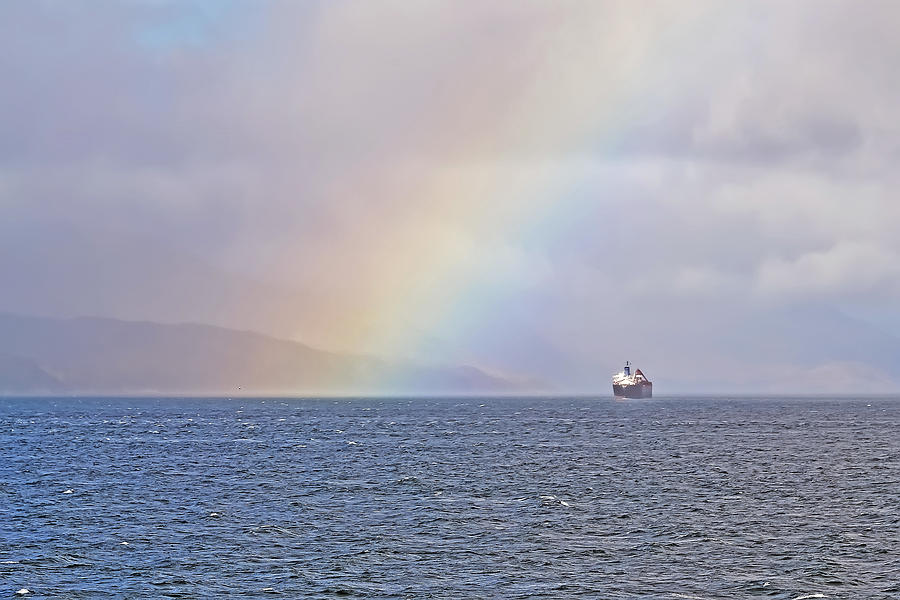 A ship and a rainbow Photograph by Elvis Vaughn