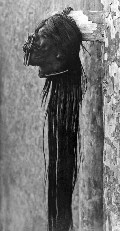 Black And White Photograph - A Shrunken Head From Ecuador by Underwood Archives